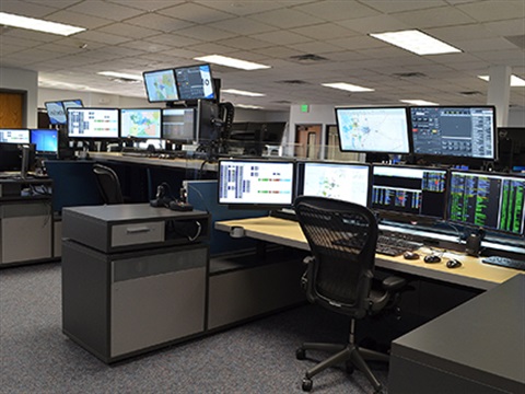 A desk and computer in the Weld County Regional Communications Center.
